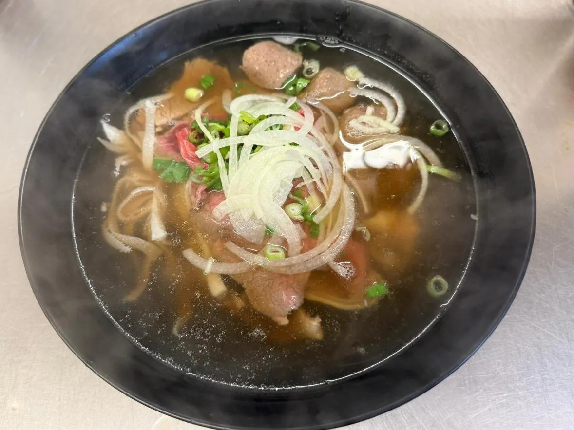 Deluxe Noodle Soup Rich noodle soup with meatballs and sliced meat at An Chi, a Vietnamese restaurant in San Francisco