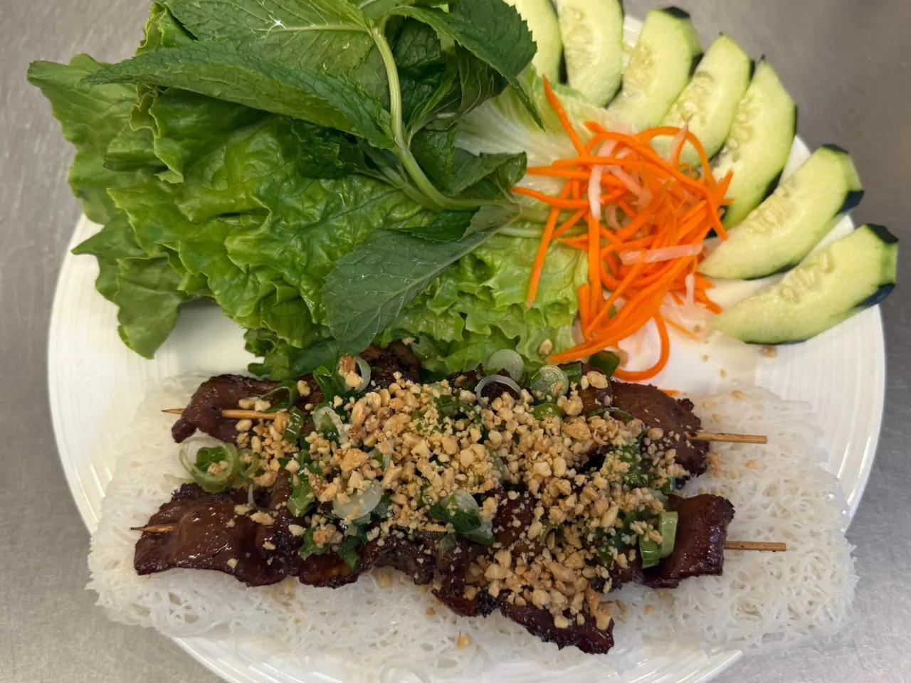 Steamed Rice Vermicelli Vermicelli with grilled meat, herbs, and veggies at An Chi, a Vietnamese restaurant in San Francisco