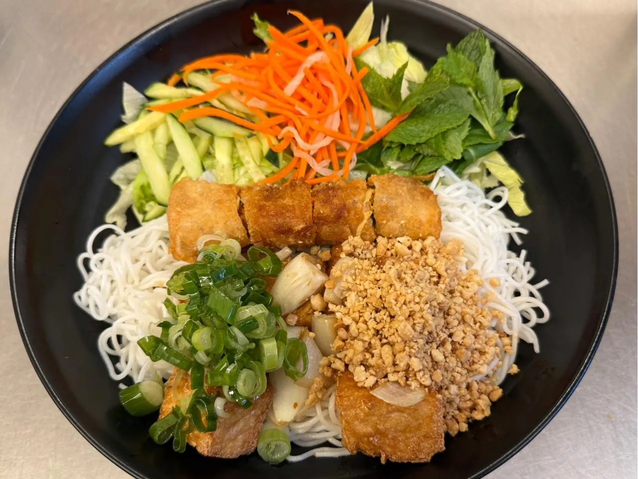 Vegetarian Imperial Roll & Tofu Vermicelli Veggie - filled vermicelli with tofu rolls at An Chi, a Vietnamese restaurant in San Francisco